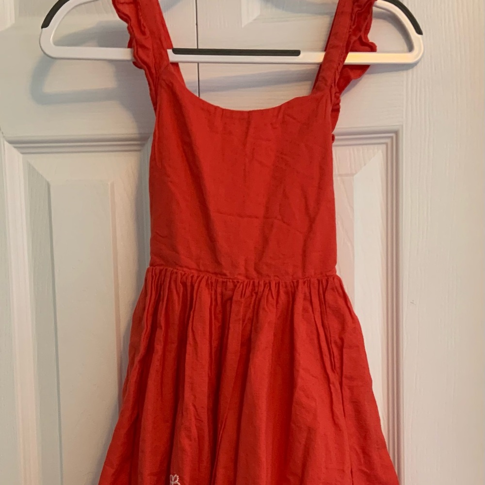 Red flowered dress.
